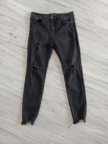 Spodnie jeans regular high waist stradivarius rozmiar L