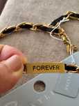 Colar Forever com fio preto entrelaçado