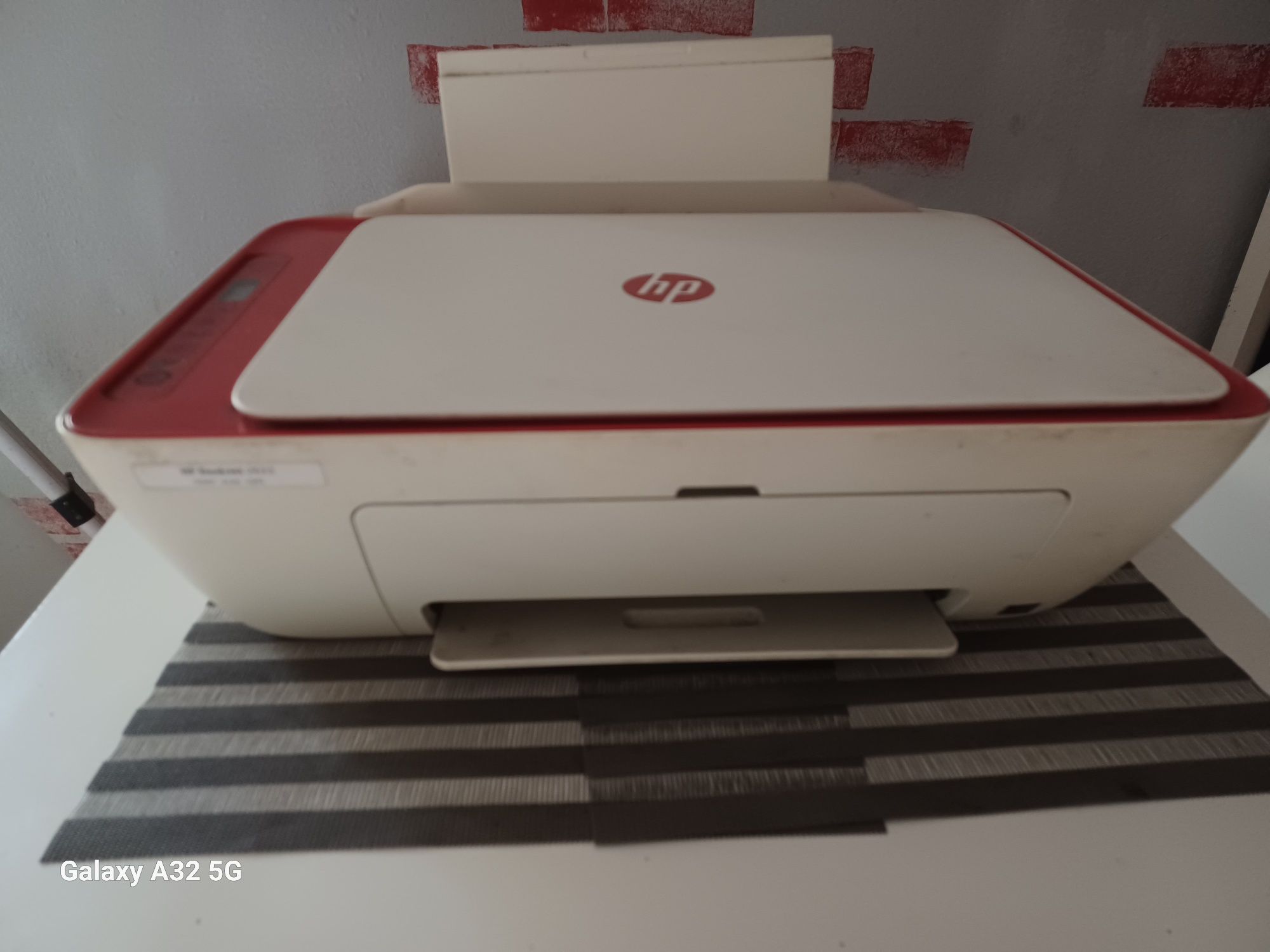 Impressora HP branco e vermelho