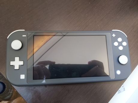 Vendo Nintendo switch lite usado poucas vezes!