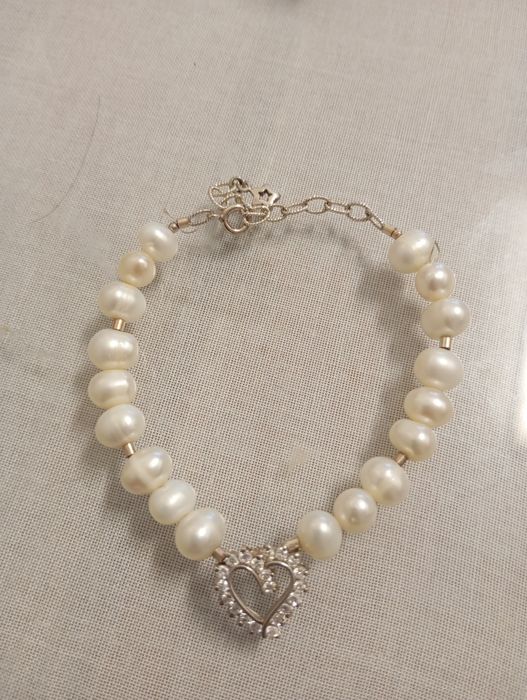 Pulseira de pérolas doces e prata