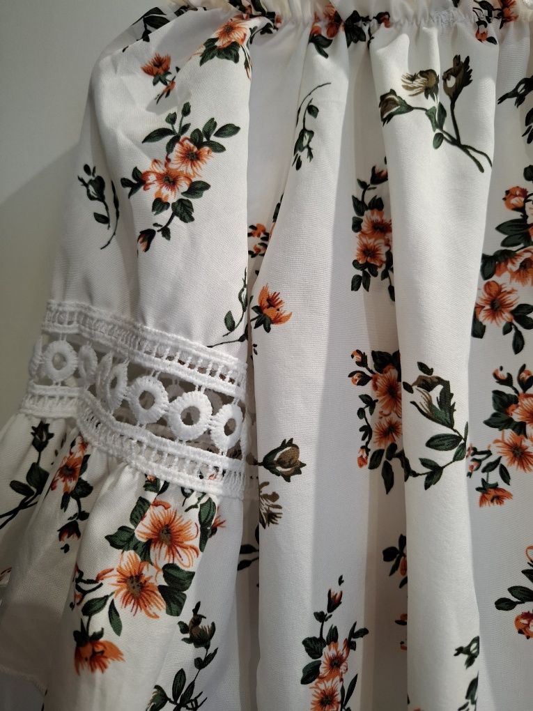 Top com alças e manga abaixo do ombro