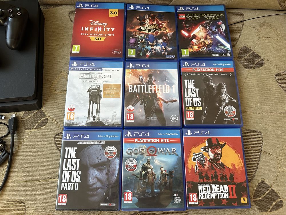 PS4 Slim 1TB 2 pady 9 gier