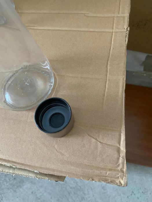 Tres garrafas de vidro