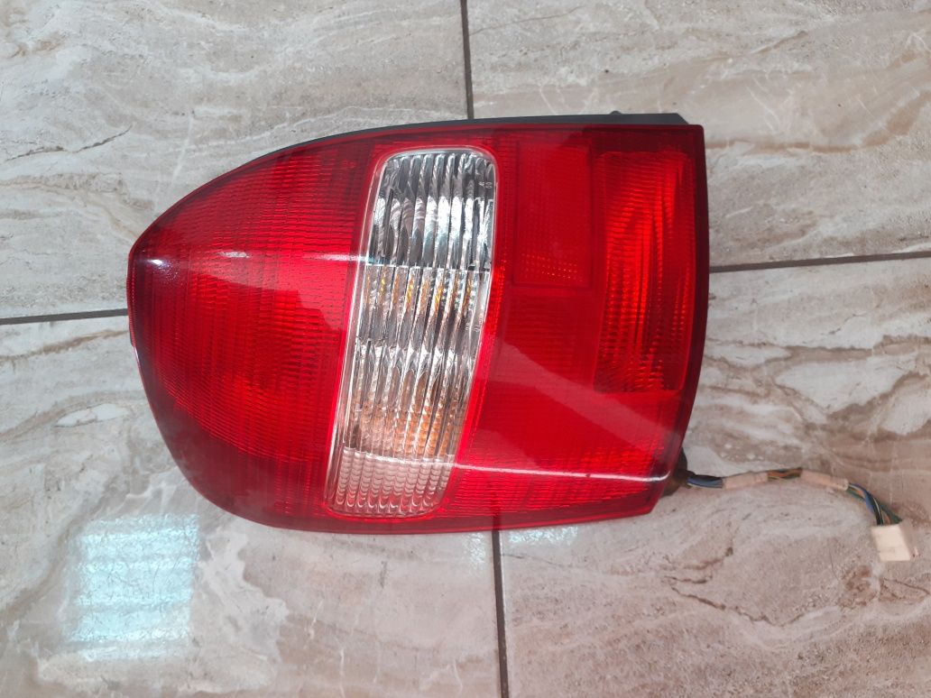 Lampa tył lewa Mazda 323F