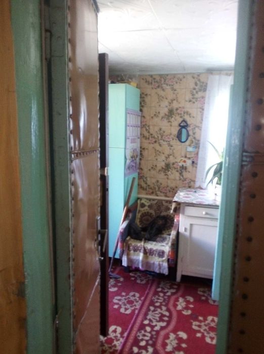 Продам половину будинка в районі Першої міської лікарні