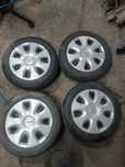 Komplet kół stalowych 4x100 opony zimowe 185/60R15 CORSA 15 cali
