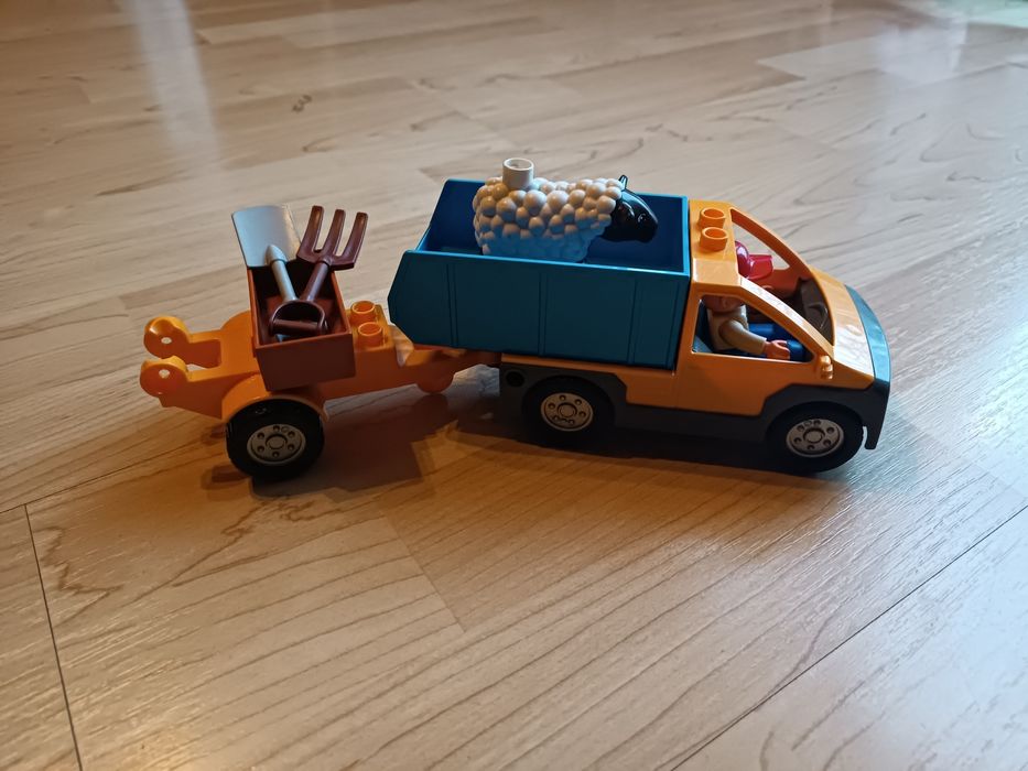 Klocki LEGO duplo zestaw auto przyczepa ludzik zwierzątko
