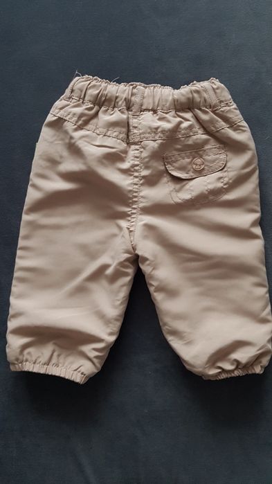 Ciepłe spodnie wiosenne na gumce z polarkiem r.68