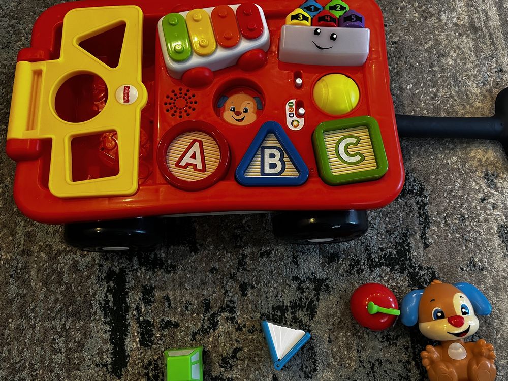 Fisher-Price edukacyjny wózek Szczeniaczka