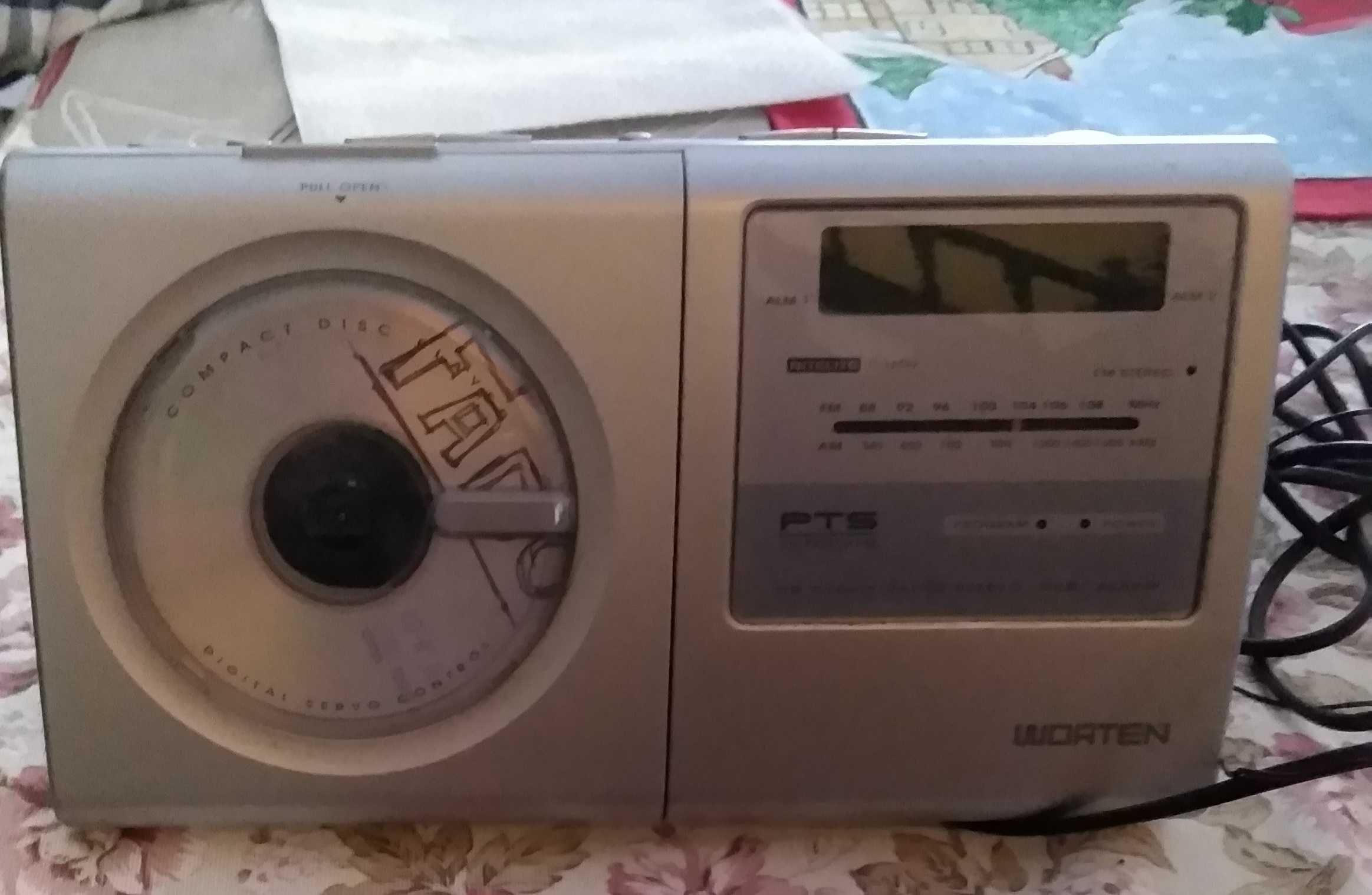 Rádio despertador com leitor de CD