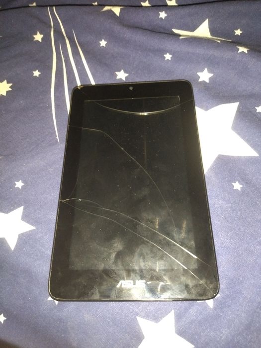 Планшет не рабочий завис на экрані загрузки, ну він включаєтся виснет