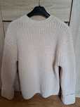 Błyszczący sweter oversize