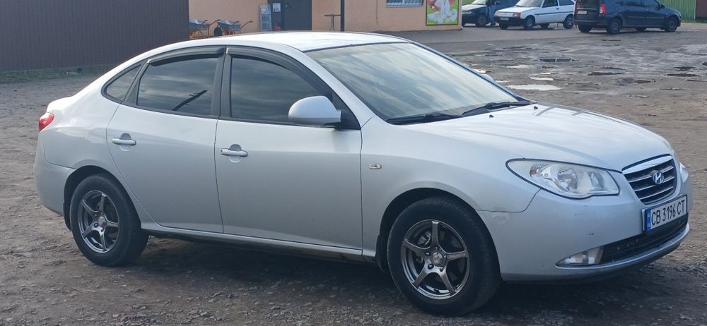 Hyundai Elantra 1.6 Газ/Бенз. АКПП