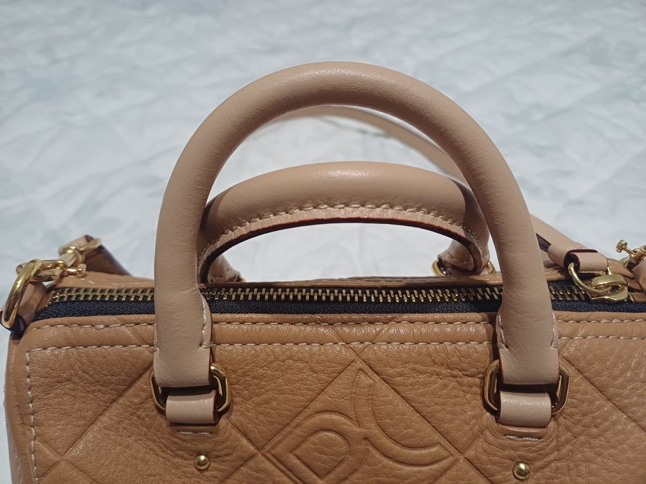 Mala, carteira nova Purificación García