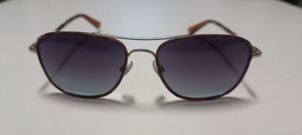 Óculos Polaroid e Web