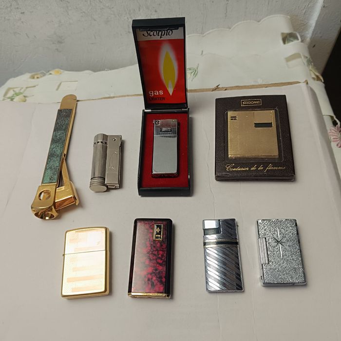 Зажигалки   Zippo ,Augusta Zunser colibri vin scorpio  Rosetta