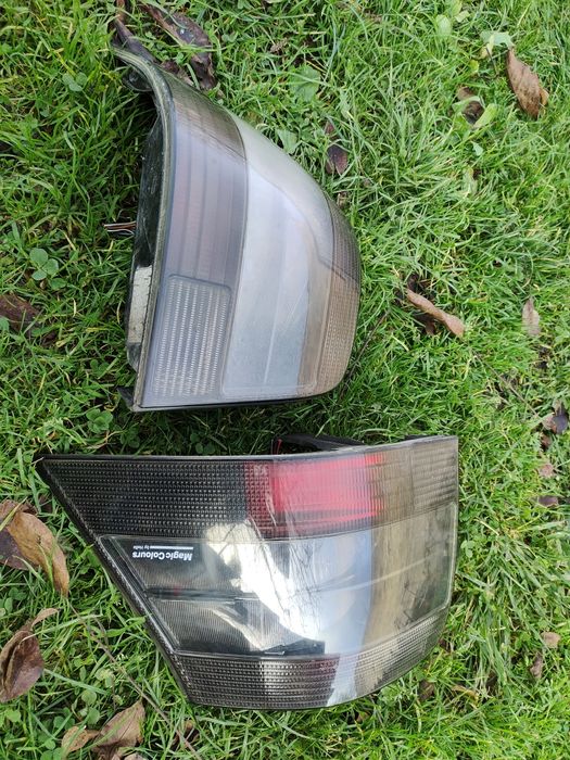 Vw golf IV 4 lampy hella magic colours czarne tylne tylnie prawa lewa