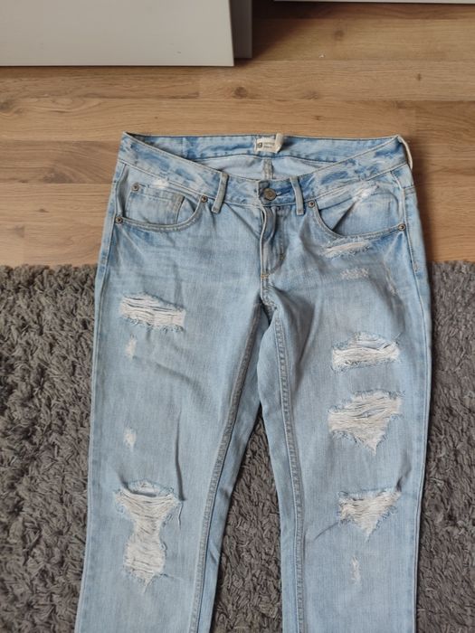 Jeansy damskie z rozdarciami Gina Tricot r. 28/34