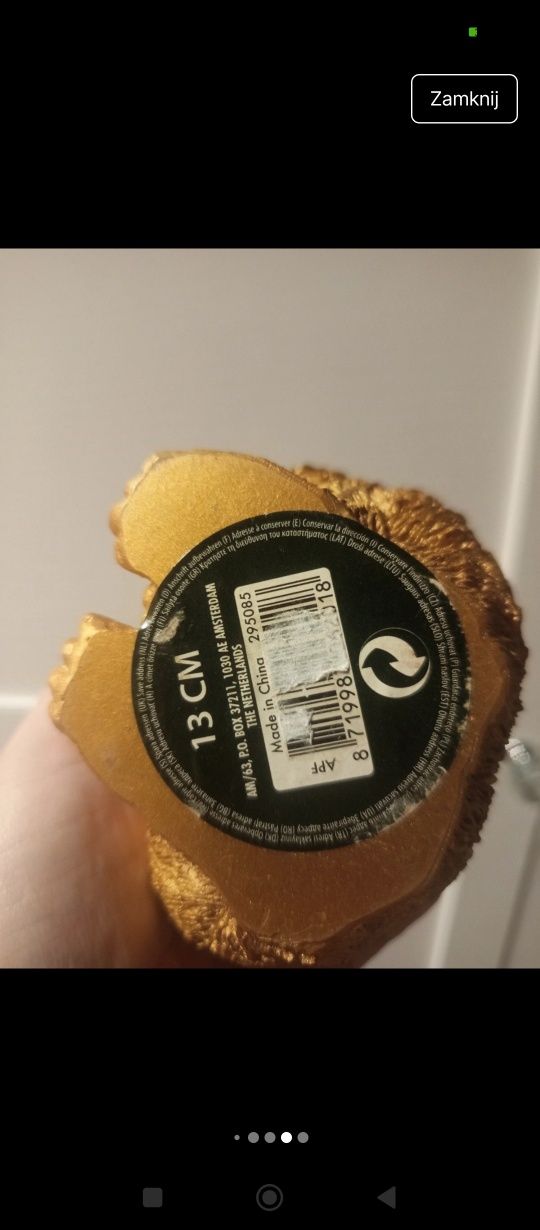 Figurka dekoracyjna złoty goryl 
Figurka jest z tworzywa