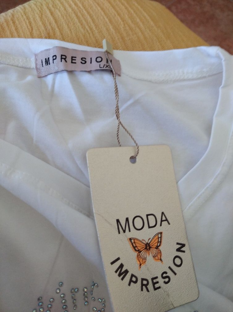 T-shirt nova tamanho L/XL