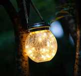 Lampa  solarna LED pękająca kula szkło