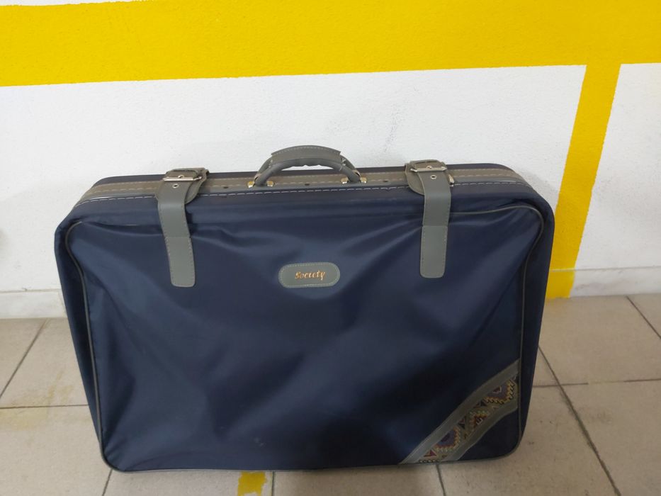 Mala de viagem como nova