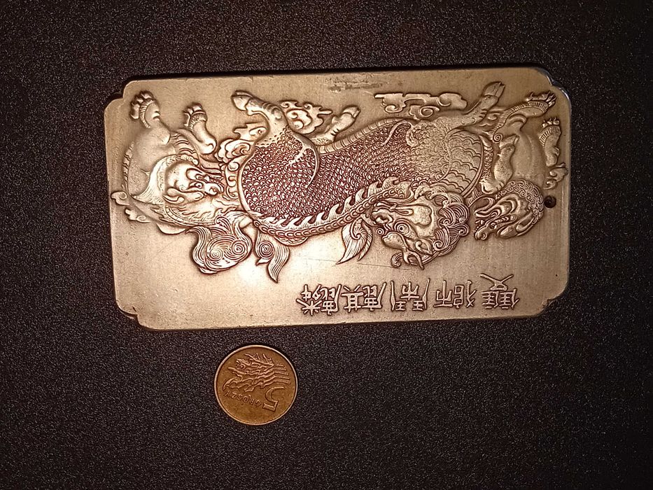 Chinska moneta z próbą