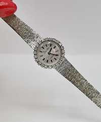 Zegarek szwajcarski z białego złota z brylantami.
