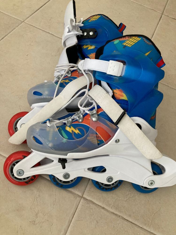 Patins em linha ( como novos )