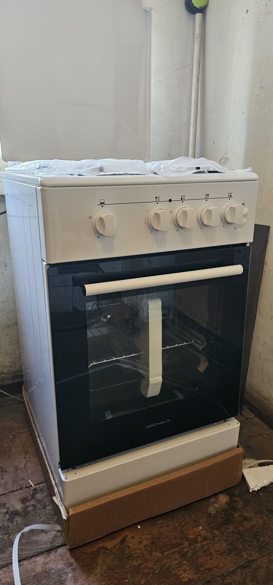 Плита газоэлектрическая GFM5611W Grunhelm