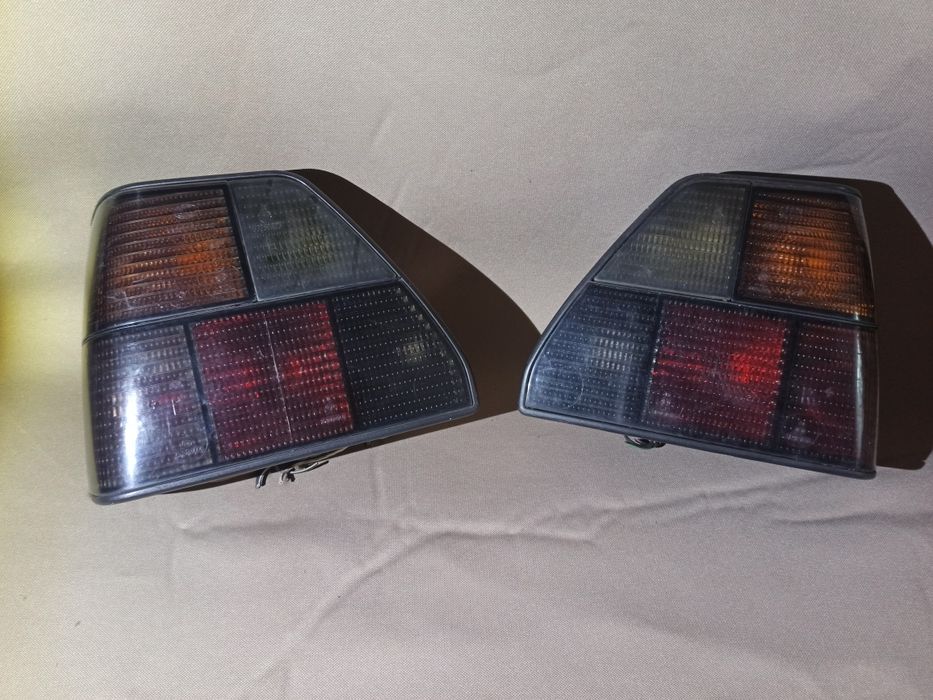 Hella black lampy tył tylne czarne dymione przyciemniane golf 2 II
