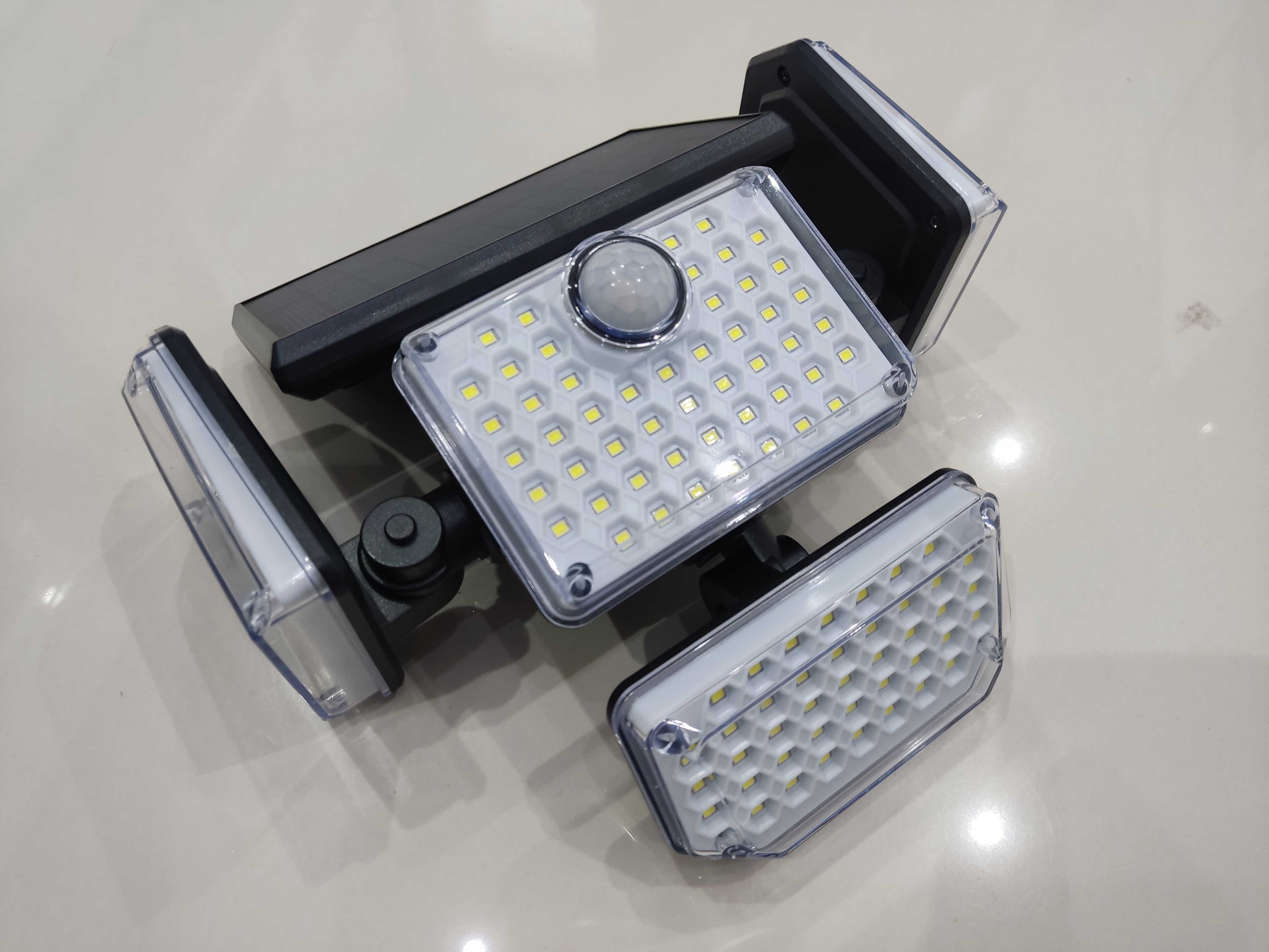 Halogen Lampa Uliczna Panel Solarny X4 LED Czujnik Ruchu + PILOT