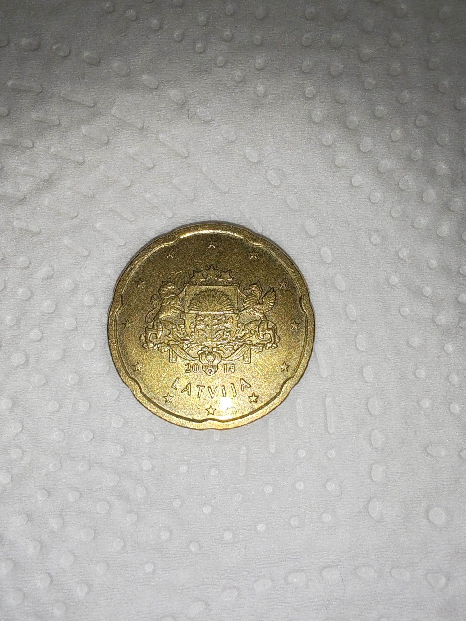 moeda de 20 cêntimos de euro da Letónia, cunhada em 2014.