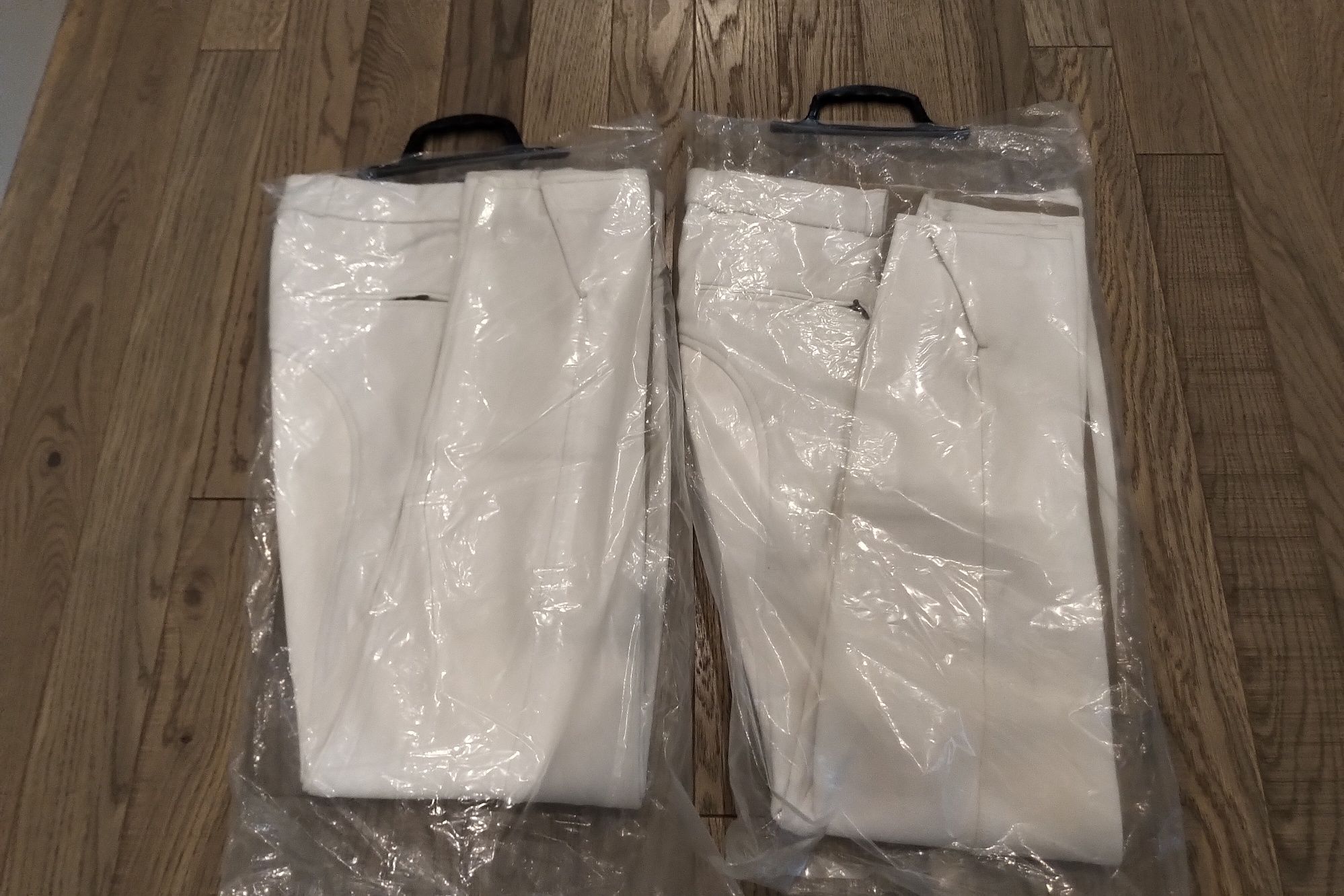 Bryczesy konkursowe białe unisex 46 (s/m) pełen lej nowe