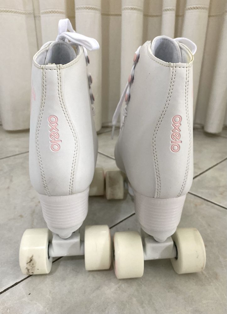 Patins 4 rodas adulto, com saco para transportar