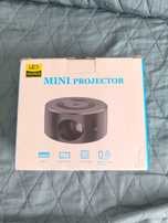Mini projetor preto novo