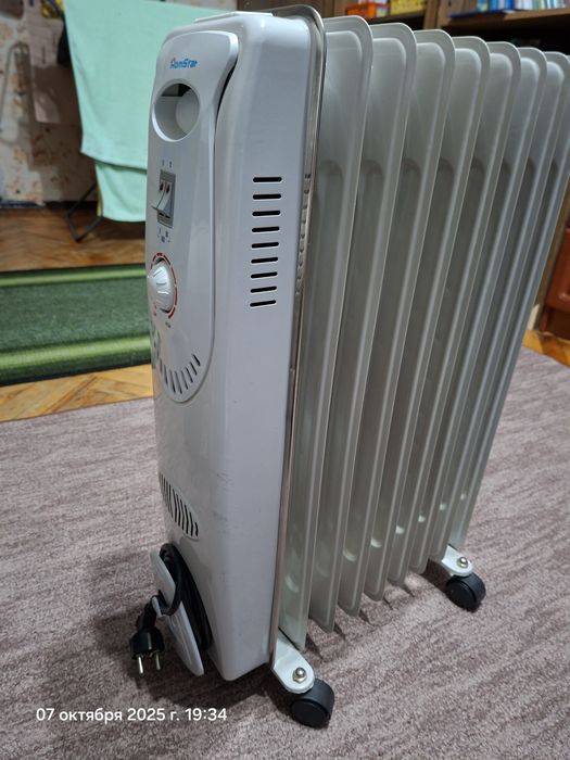 Обігрівач масляний,камін