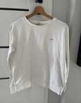 Biala bluza lee