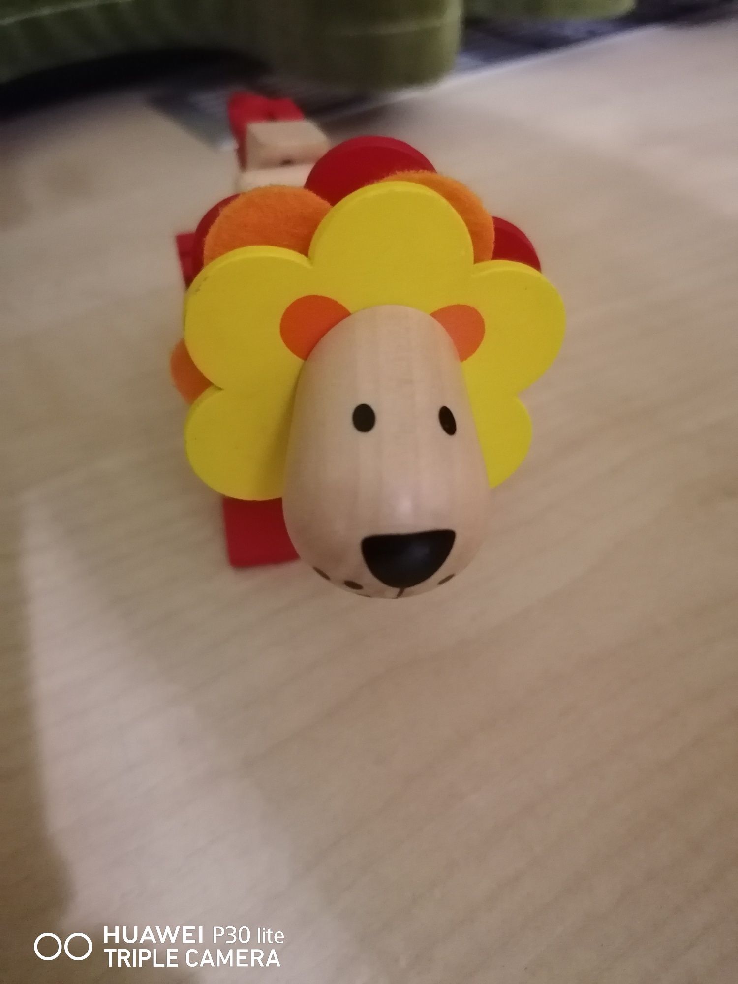 Дерев'яна розвиваюча іграшка лев.