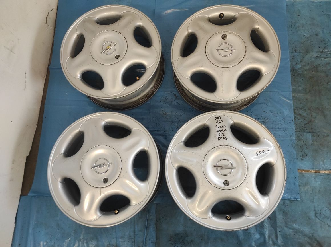 587 Felgi aluminiowe ORYGINAŁ OPEL R 14 4x100 otwór 56,6 mm