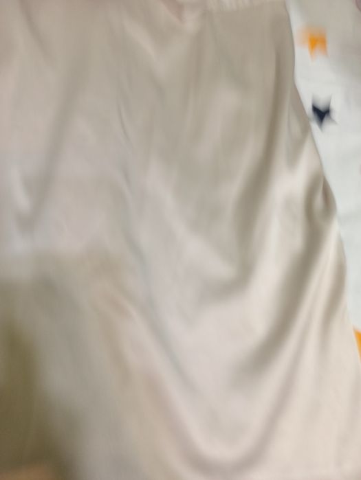 Sukienka kremowa z kokardą