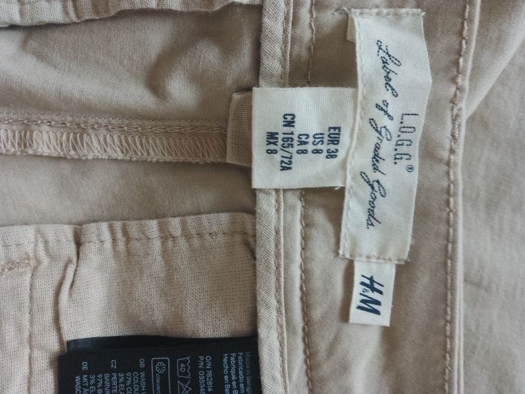 Spodnie bawełniane kremowe wizytowe rozmiar M firmy H &M