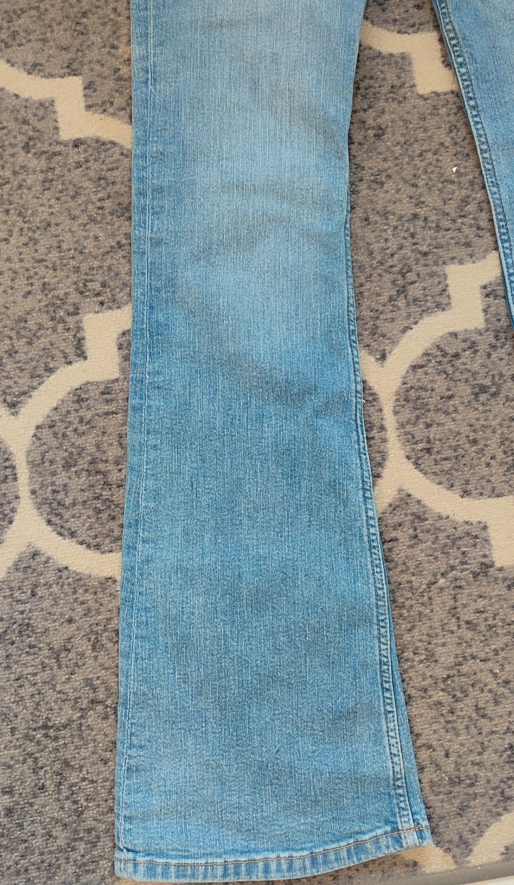 Nowe jeansy flare szerokie nogawki