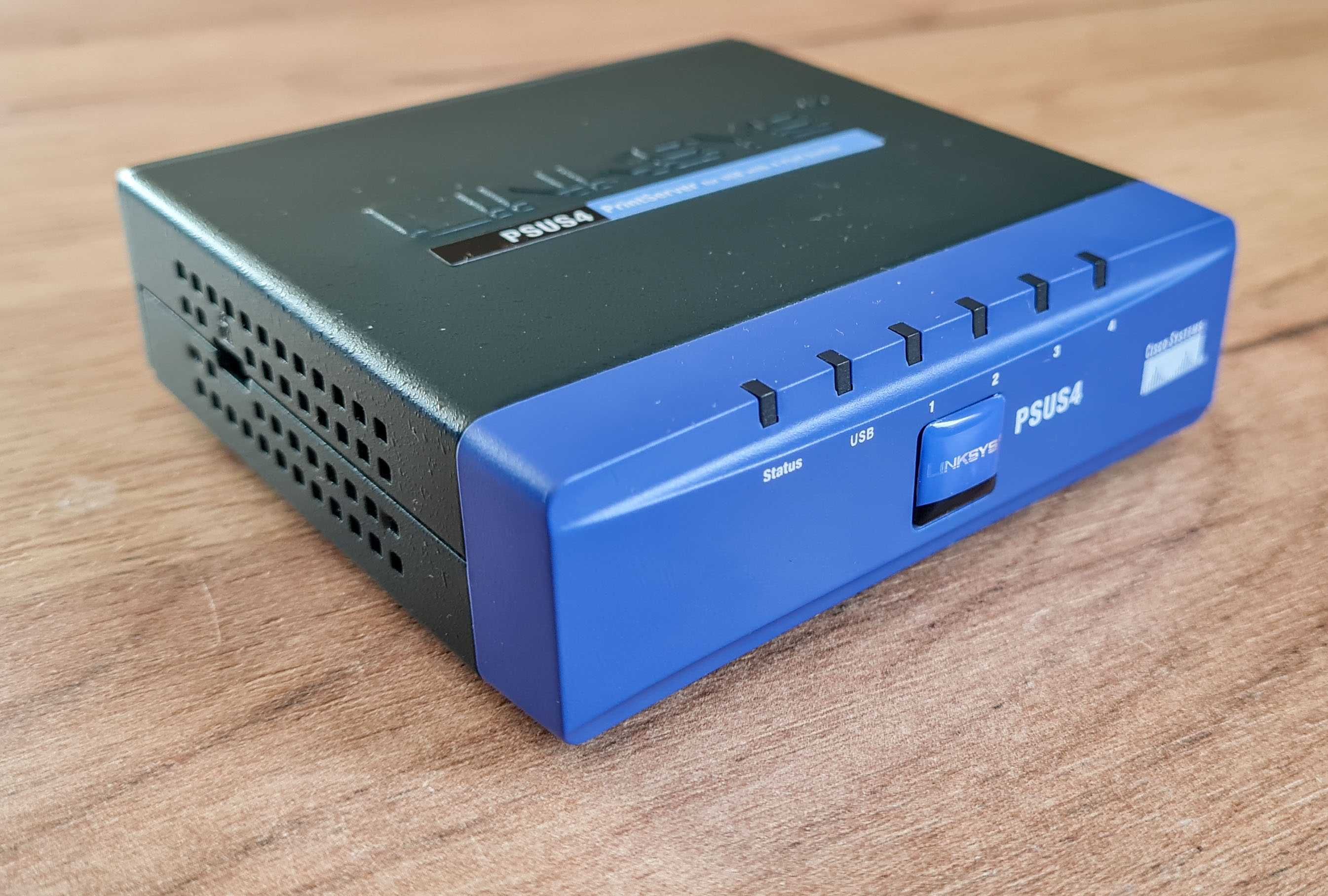 Принтсервер Linksys PSUS4 для USB принтерів із 4-портовим комутатором.