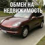 Обмен Porsche Cayenne на недвижимость в Киеве