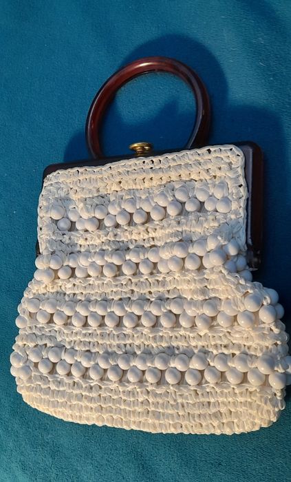 Pochete feminina anos 60