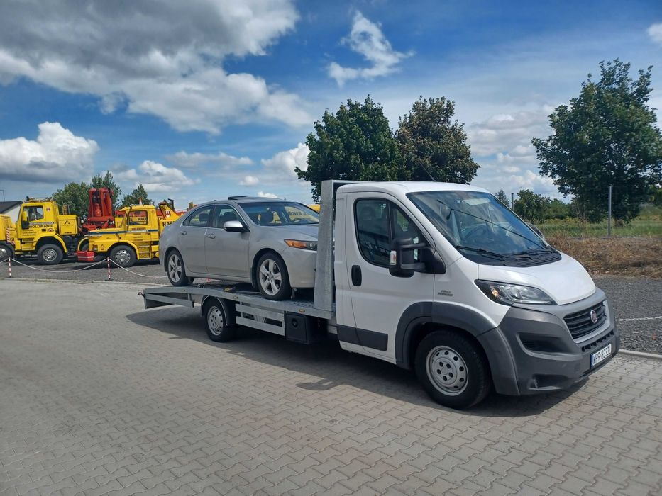 Holowanie   Laweta  Pomoc Drogowa  Transport  24H Warszawa i Okolice