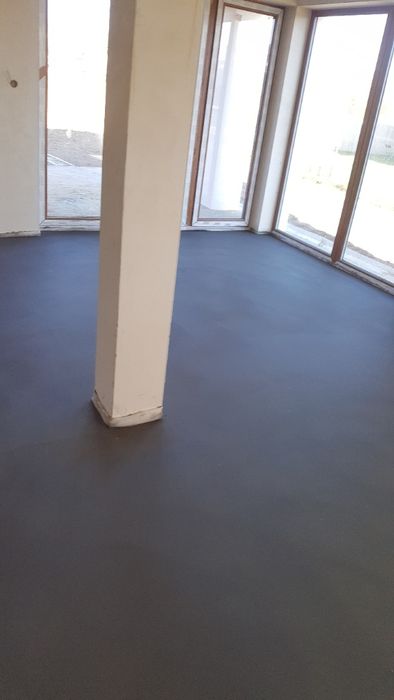 Posadzki wylewki betonowe mixokretem.Układanie styropianu.STYROBETON