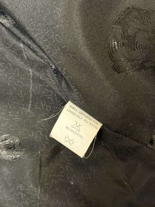 Норкова шуба жіноча